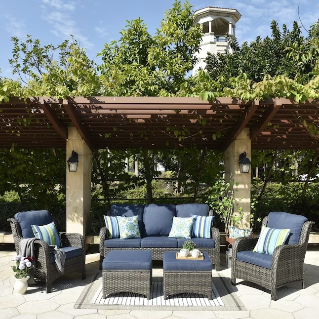 navy outdoor furniture under pergola